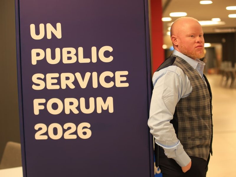 Standing in profile at the UN Public Service Forum in Tbilisi